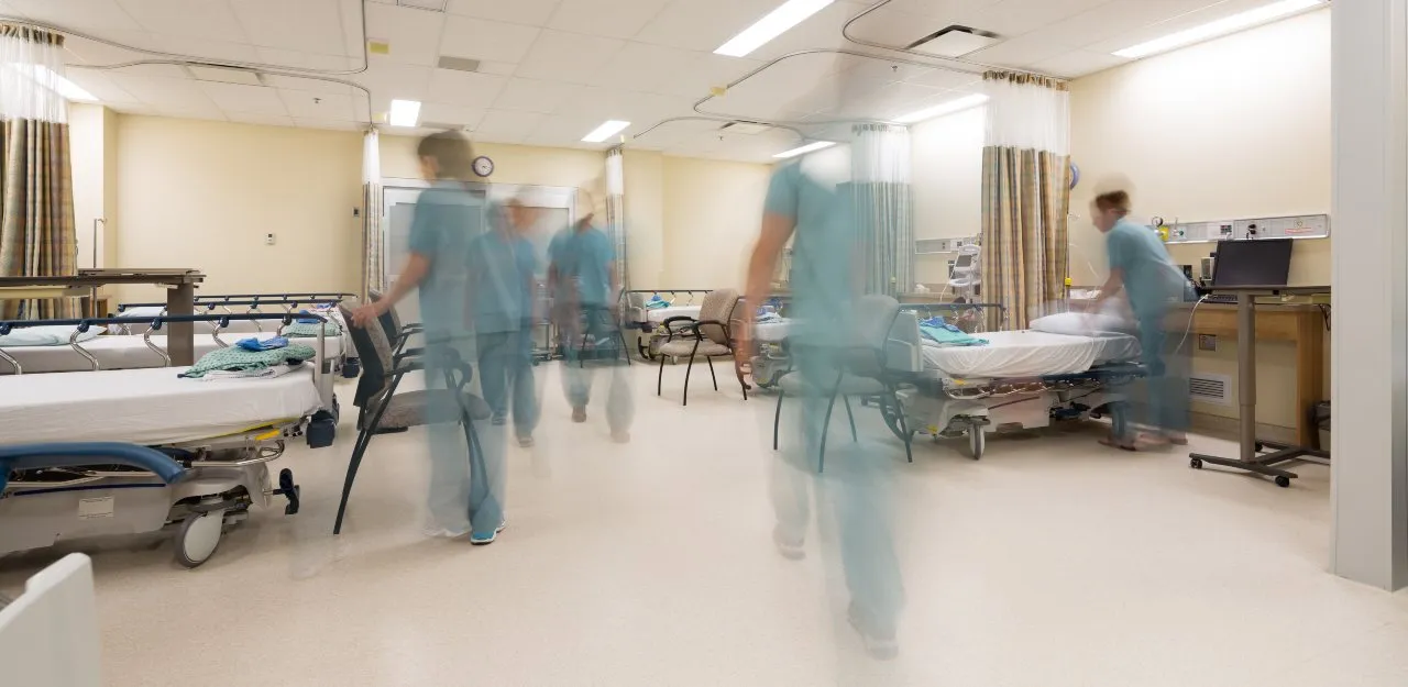 ER nurses shadows walking about an ED